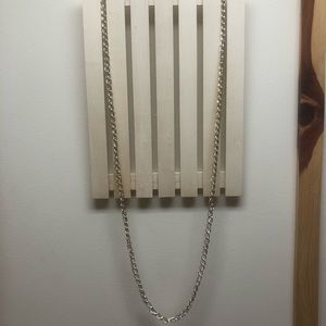 Extra long double-linked golden/silver chain necklace.